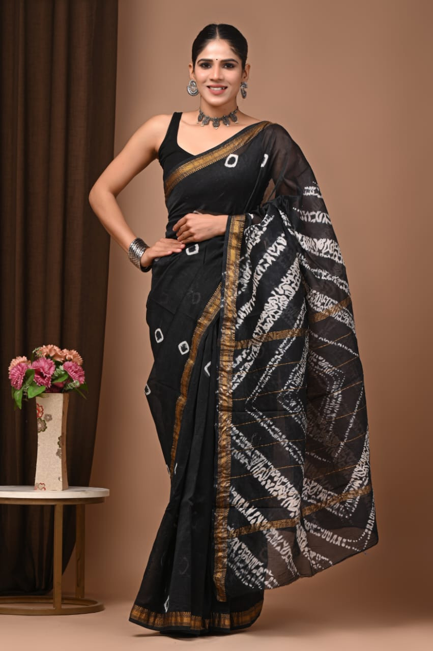 Black and White Maheshwari Silk Saree with a Gold Border and Hand Block Print.