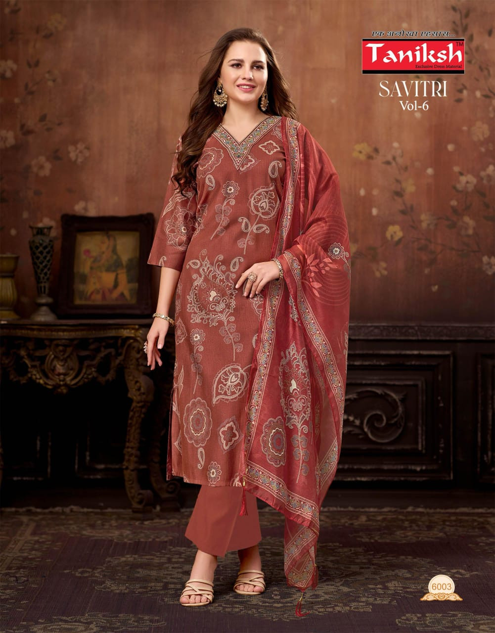 Taniksh Savitri suit in rust with abstract print.