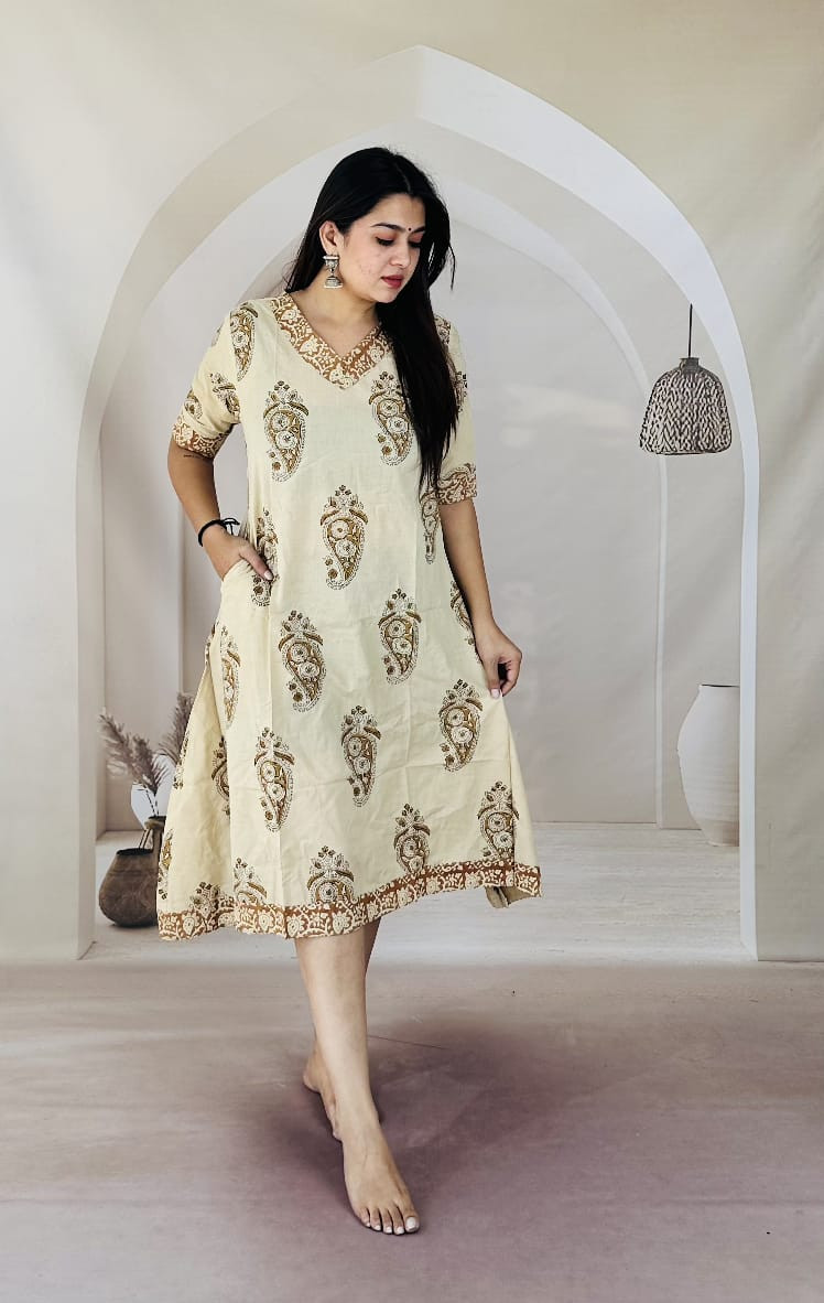 Beige or off-white hand block printed cotton short kurti.