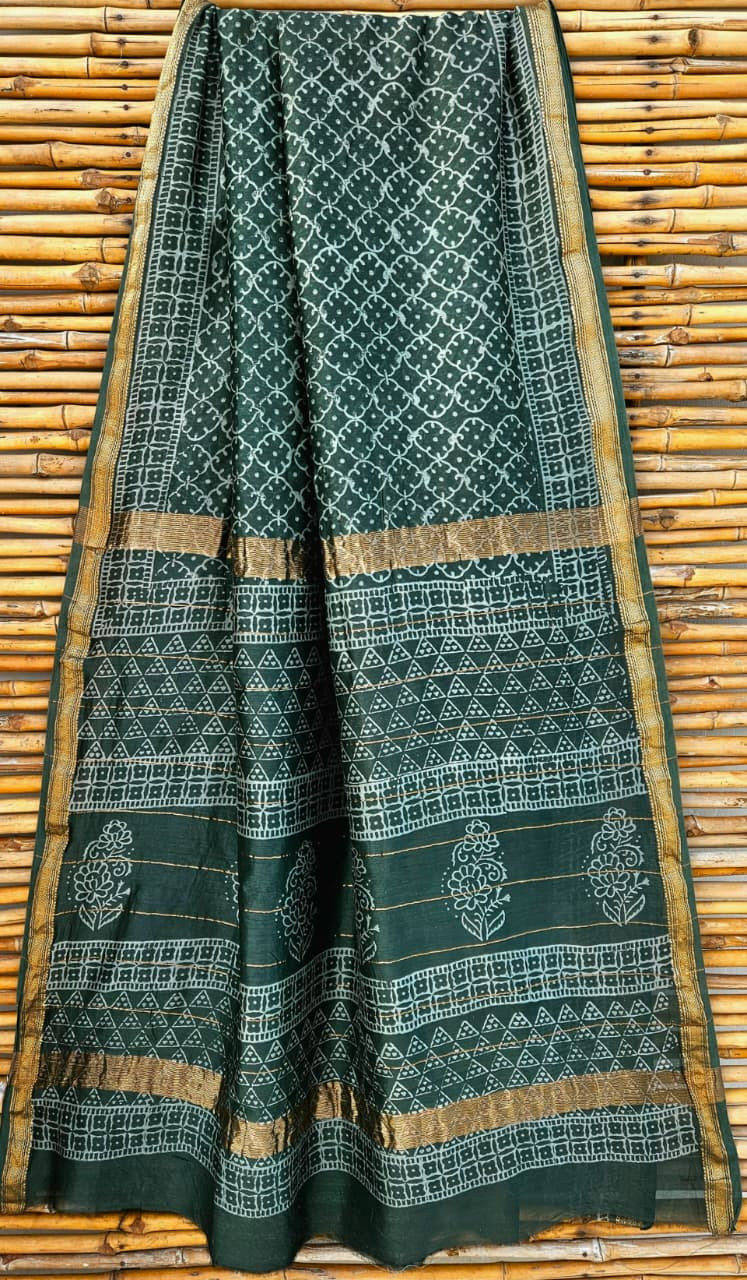 dark green hand-block printed Maheshwari silk/cotton blend saree with traditional motifs and a golden zari border