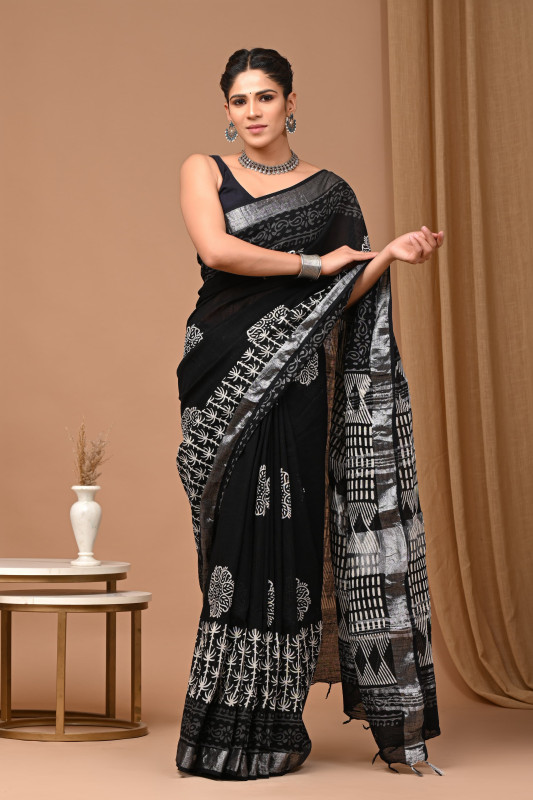 Black and silver handblock printed abstract and floral pattern saree.