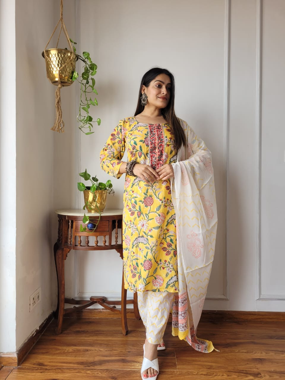 yellow floral block-printed cotton kurta set with white printed dhoti-style pants and a matching dupatta