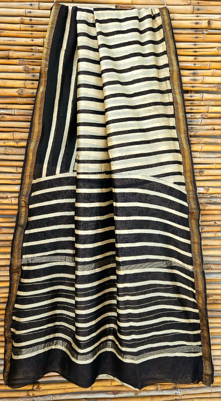 black and off-white striped Maheshwari silk-cotton blend saree with a gold zari border [1.1]