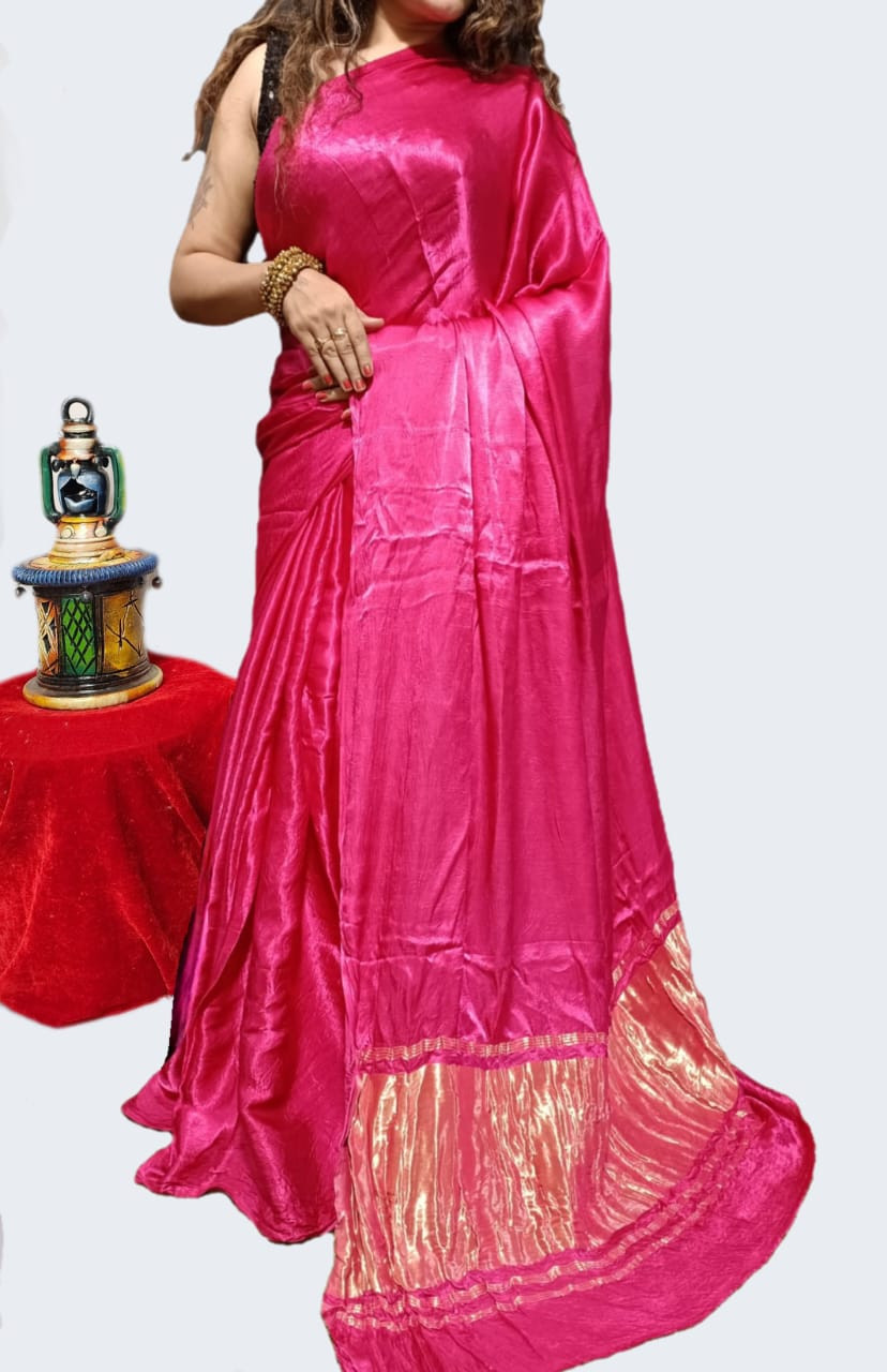 Pink Metallic Crushed Modal silk plain daying saree with Micro-Pleated Texture and Gold Shimmer Border.