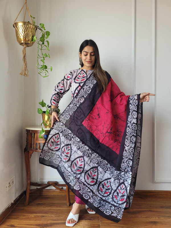 black and pink hand block printed cotton kurta, pants, and dupatta suit set