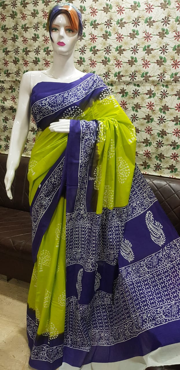 Vibrant Lime Green and Purple Batik Cotton Saree with Traditional Paisley and Geometric Patterns.