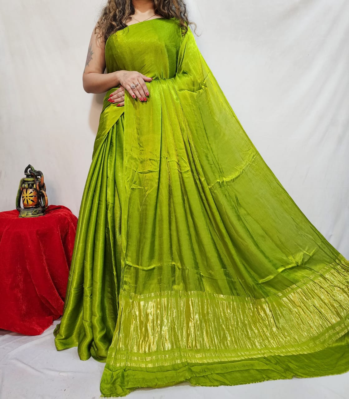 Parrot Green modal  Silk Saree with an Elegant Golden Zari Border
