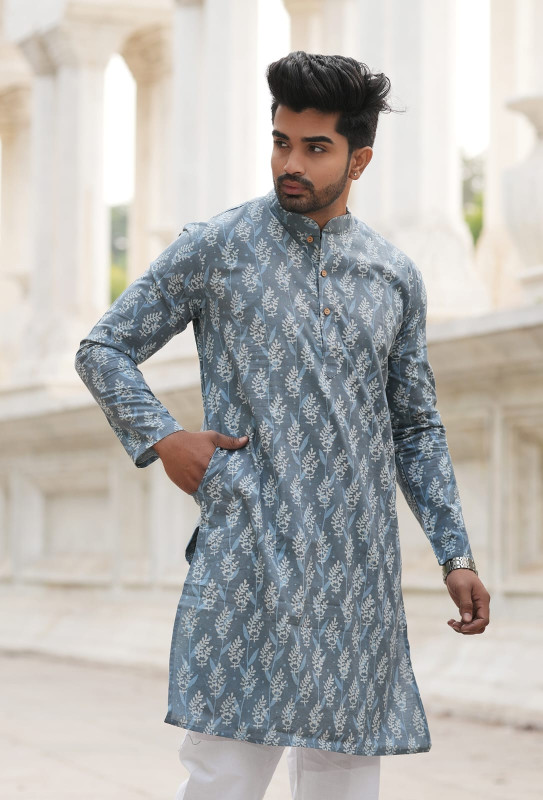 Grey or taupe with a dabu print or hand block print pattern.