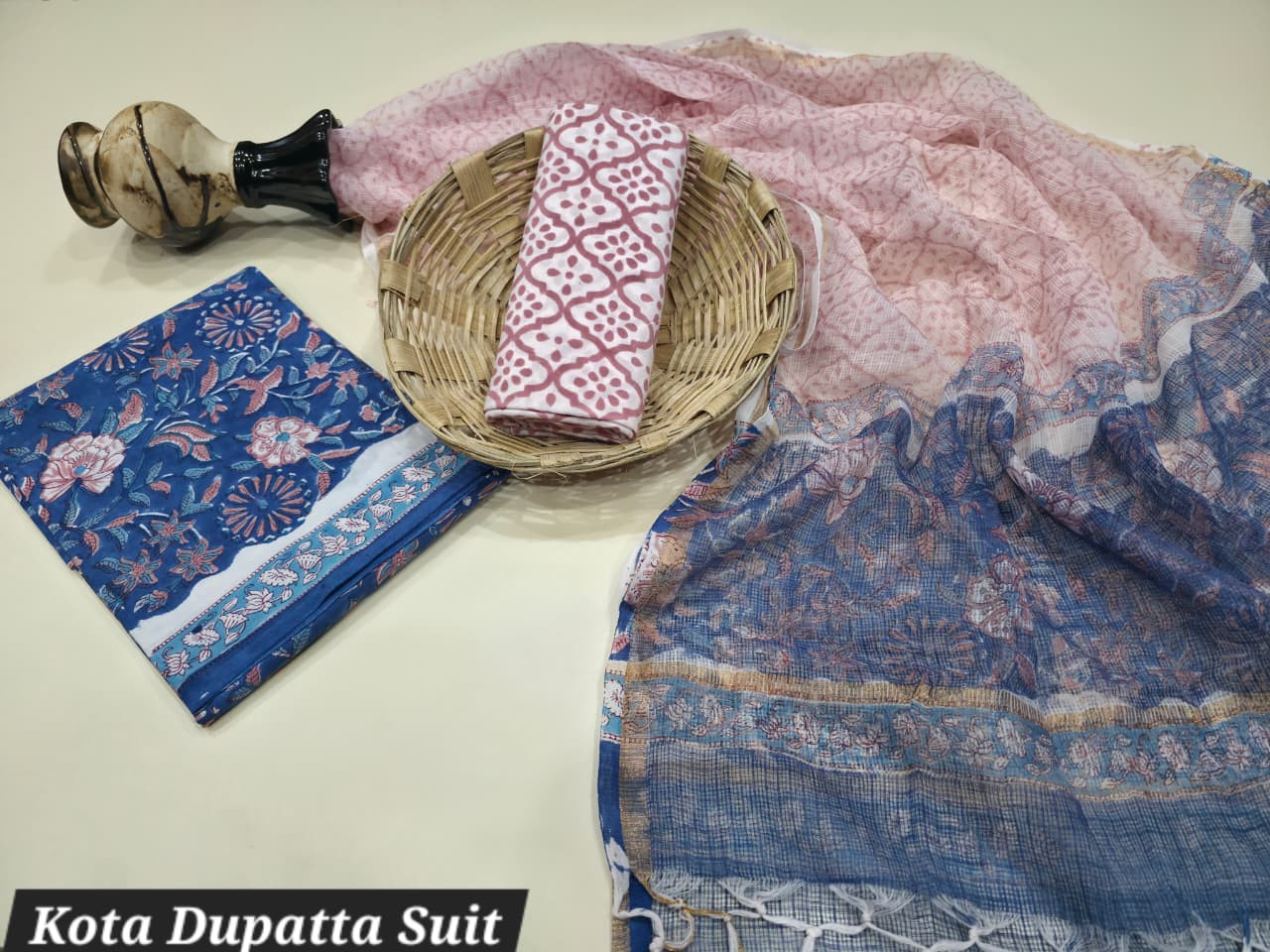 Kota Dupatta Suit made of pure cotton with a Kota Doria dupatta in blue and pink colors featuring a hand block printed floral pattern.