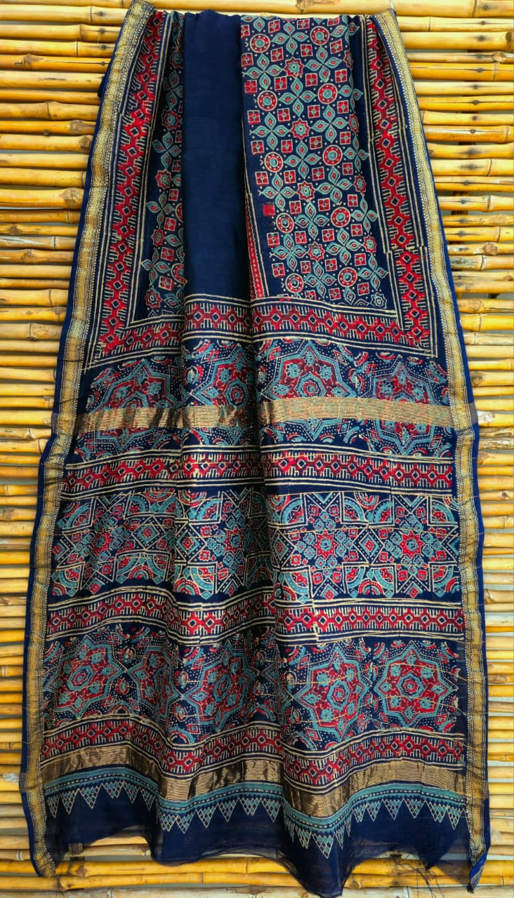 blue hand-block printed Maheshwari silk/cotton blend saree with red and light blue traditional motifs and a golden zari border