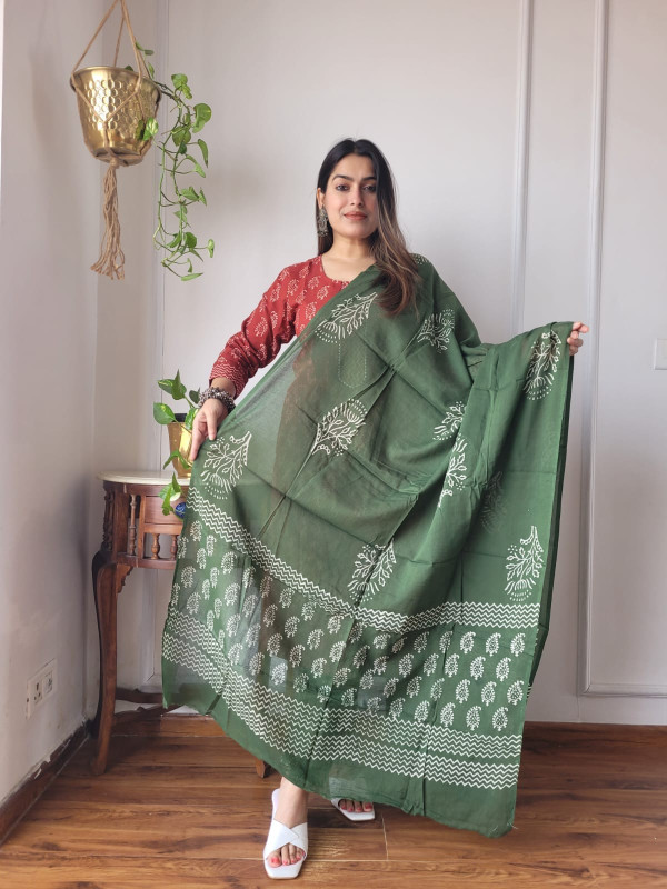 red and green hand block printed cotton kurta, pants, and dupatta suit set