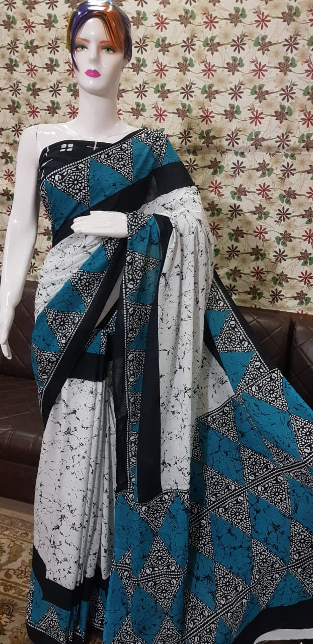 White and Teal Batik Cotton Saree with Triangular Geometric Patterns.