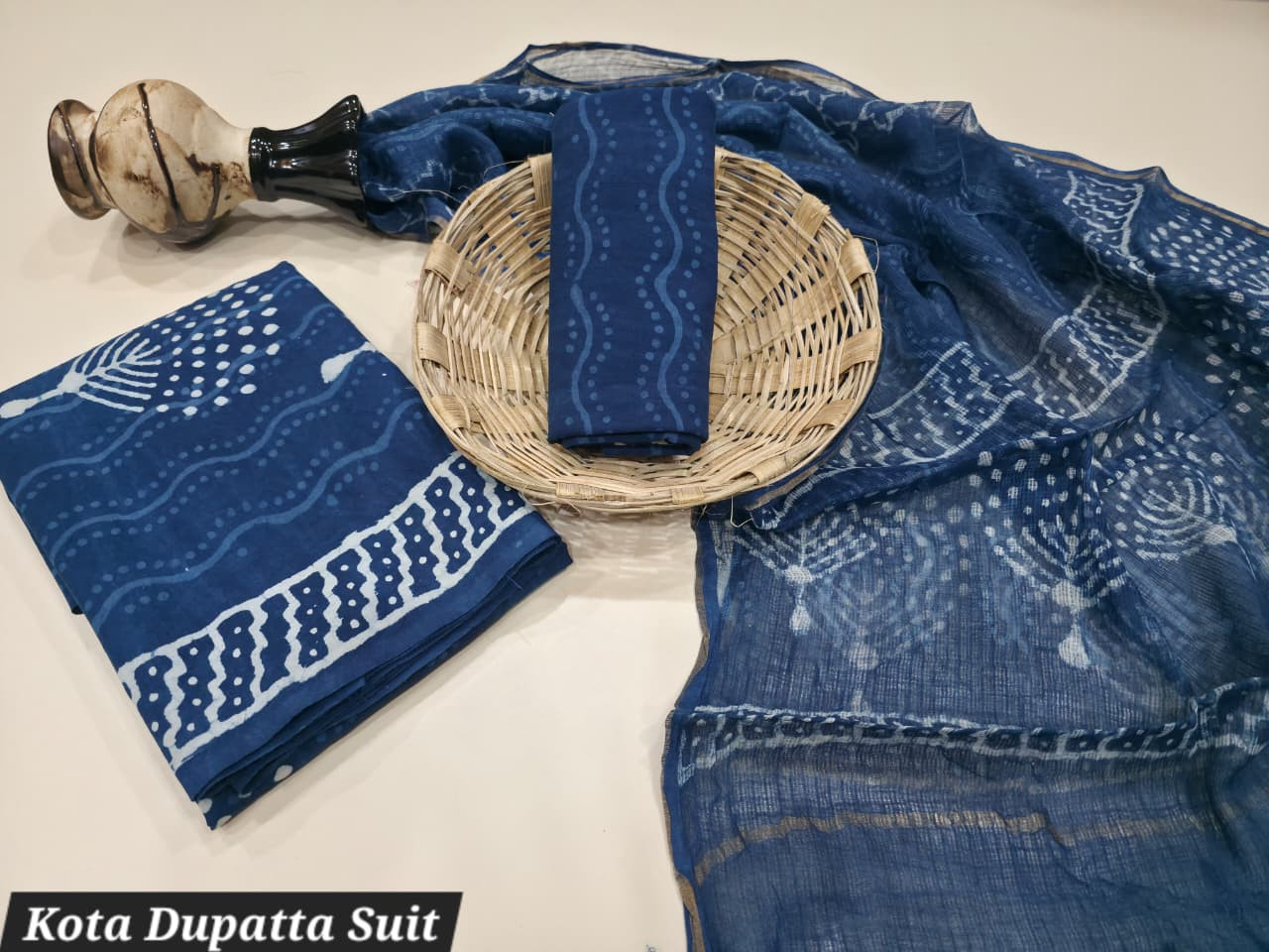 Natural Indigo Dabu Hand Block Printed Cotton Suit with a sheer Kota Doria Dupatta.