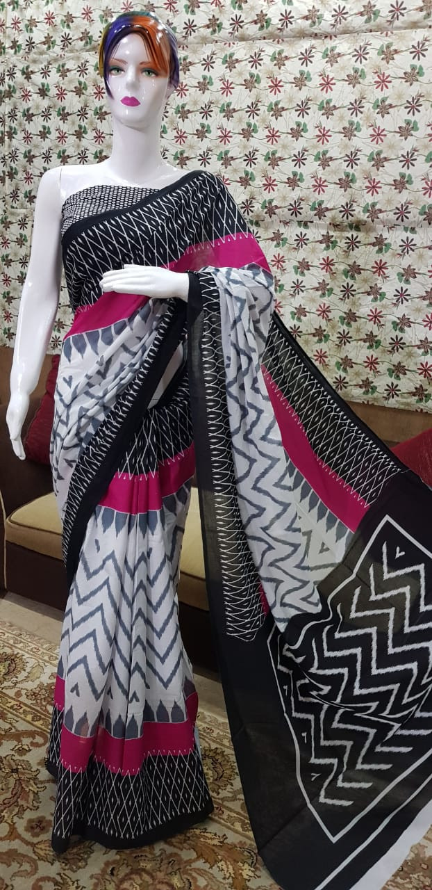 Black, White, and Pink Cotton Mulmul Saree with Geometric Ikat Print and Zigzag Borders.