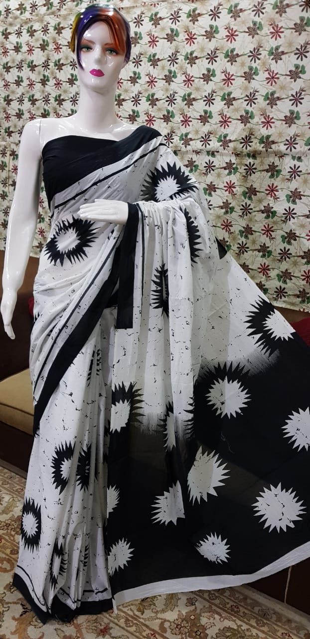 Monochrome White and Black Batik Saree with Sunburst Motifs.