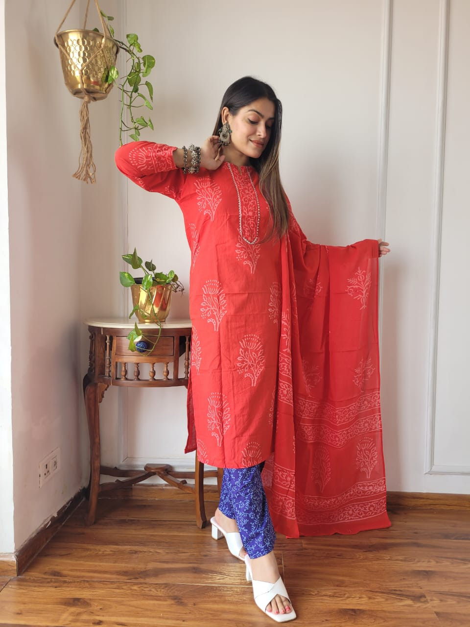 red block-printed cotton kurta, pants, and dupatta set