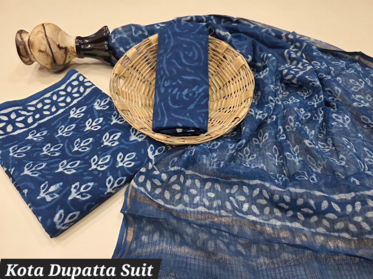 Indigo Dabu Print Cotton Suit with a Kota Doriya Dupatta.