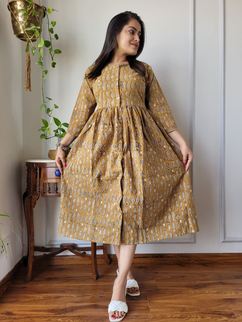 Mustard Yellow Hand Block Printed Cotton One Piece Dress with a white/blue fish pattern and a front button placket