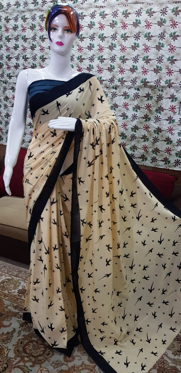 Elegant Cream Cotton Saree with Black Silhouette Bird Print and Solid Contrast Border.
