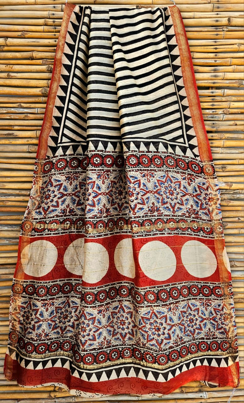 black and white striped Ajrakh hand-block printed Maheshwari silk/cotton blend saree with traditional motifs and a red and gold zari border